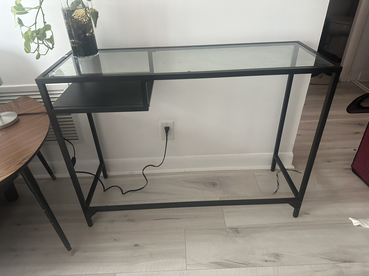 Black desk with glass thumbnail