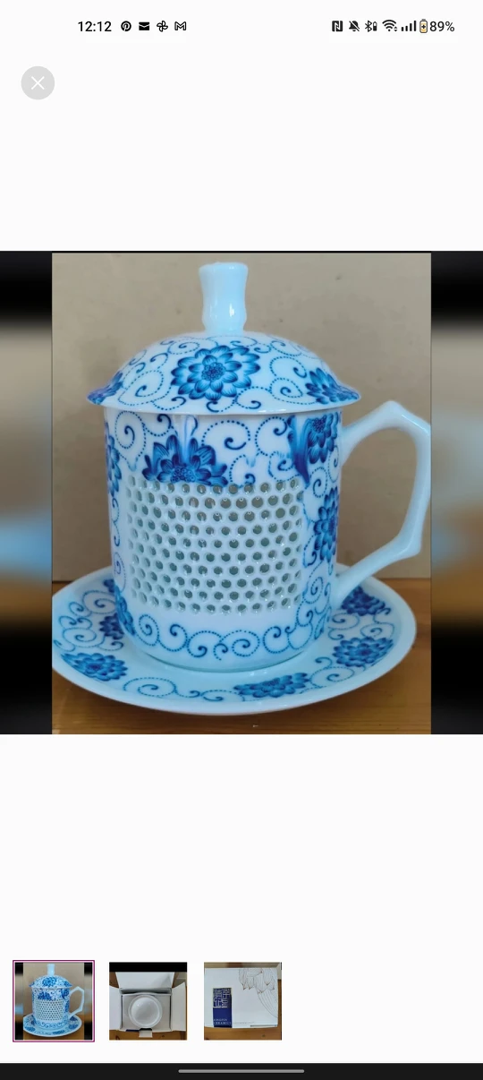 Brand new blue and white teacup with lid