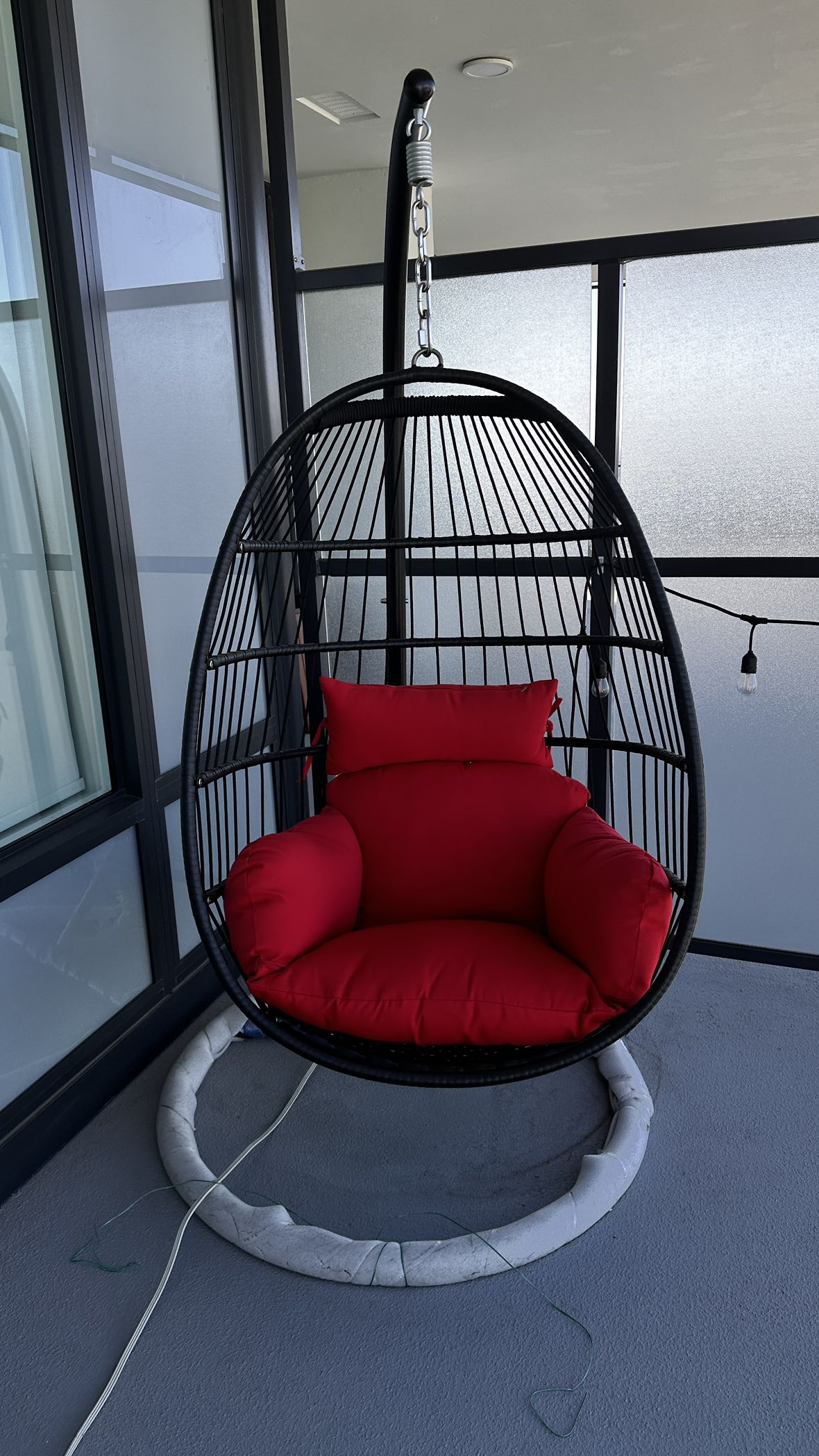 Egg shaped swing for one person with waterproof cover