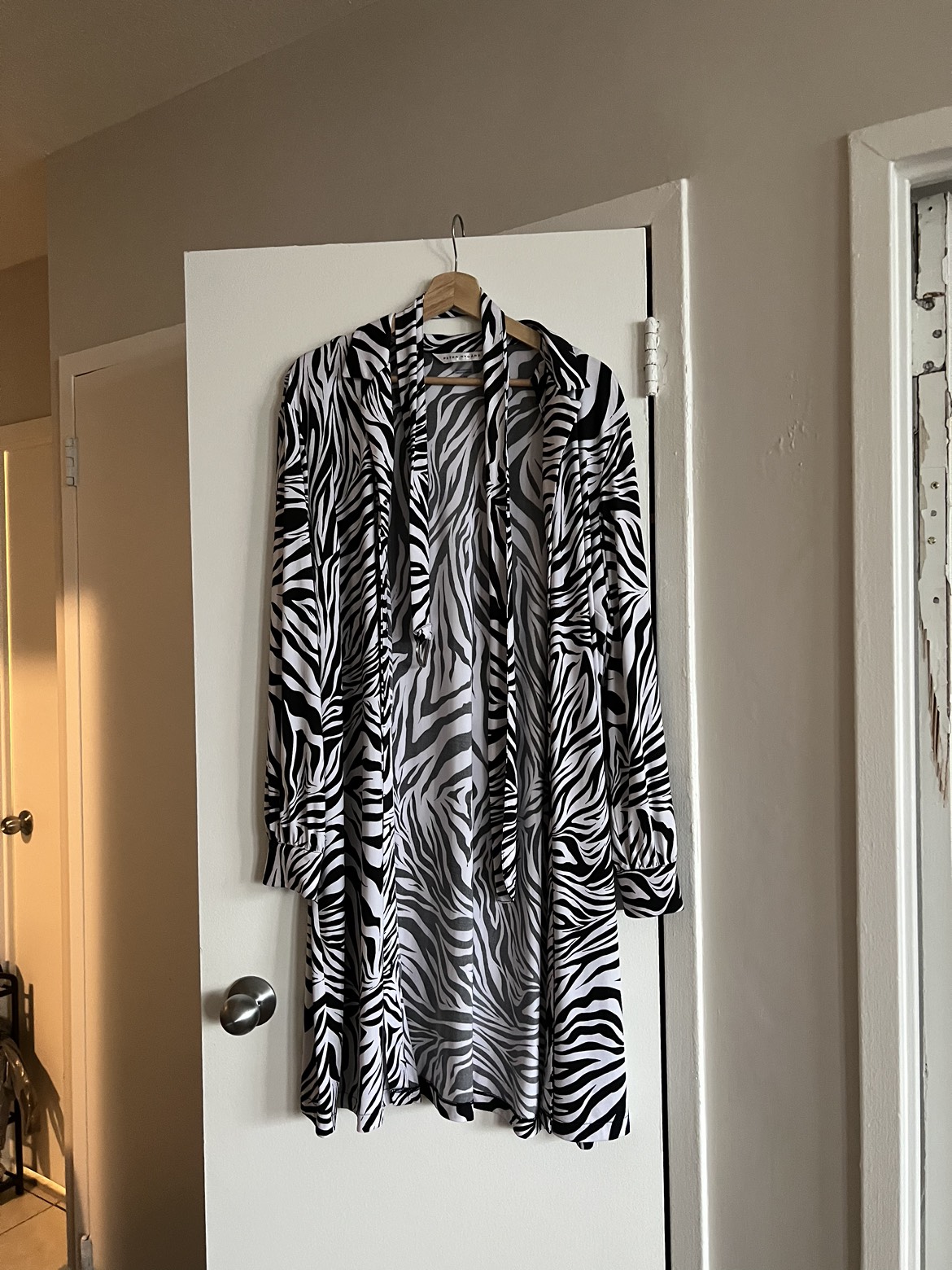 Peter Nygard’s dress thumbnail