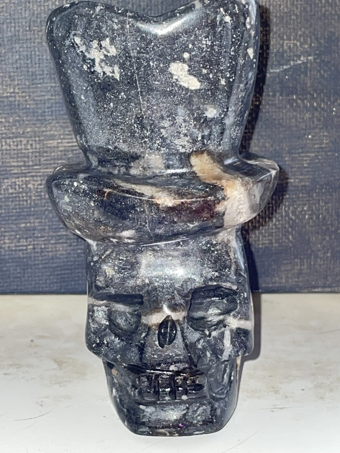 Carved skulls with tophats image indicator(7)