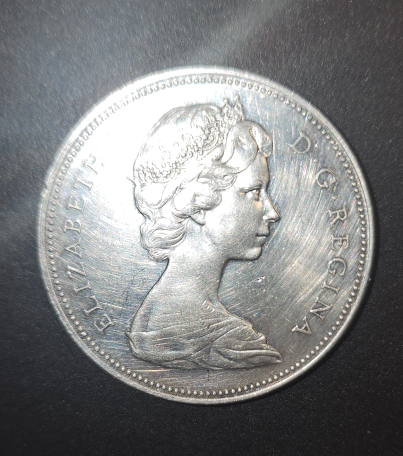 1884 Morgan dollar and 1867-1967 Canadian dollar coins - photo 4