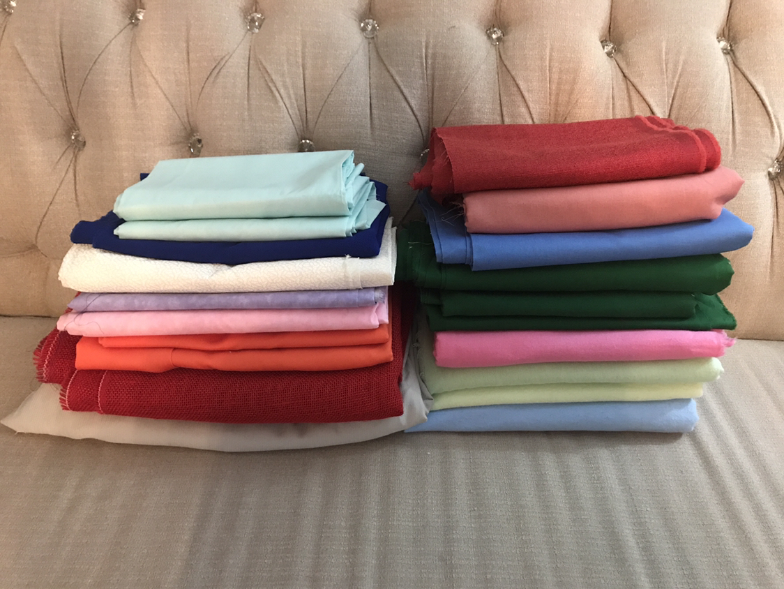 20 pieces  of various size and textured fabrics thumbnail