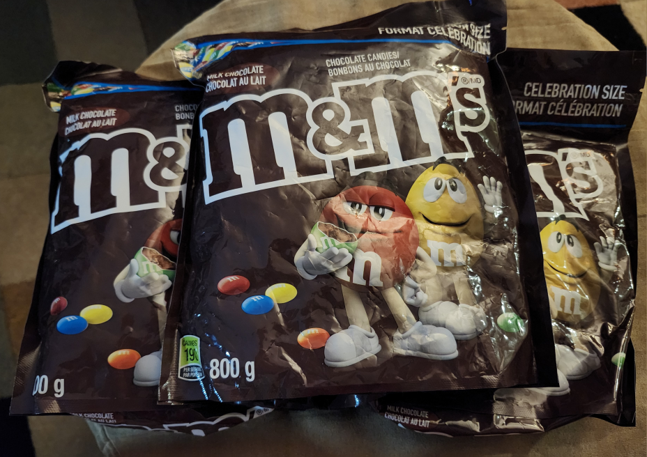 800 g bags of chocolate M&Ms - $8