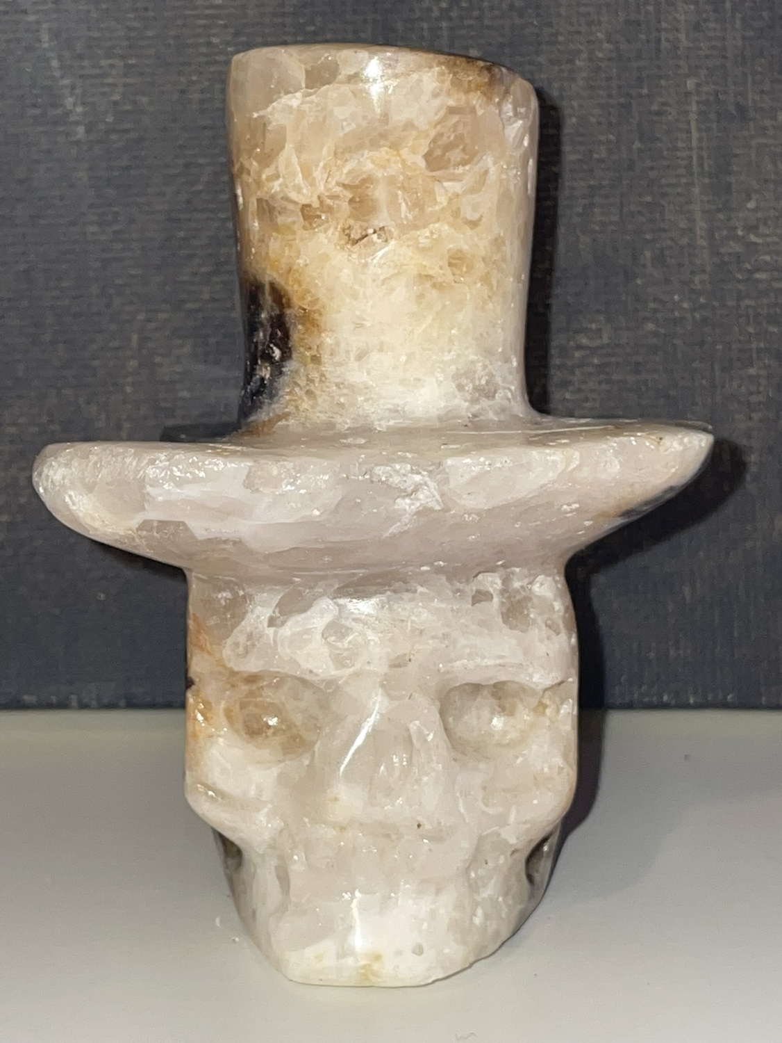 Carved skulls with tophats image indicator(6)