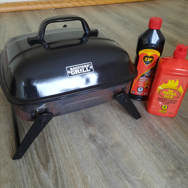 Portable Grill with Firestarter and some Charcoal thumbnail
