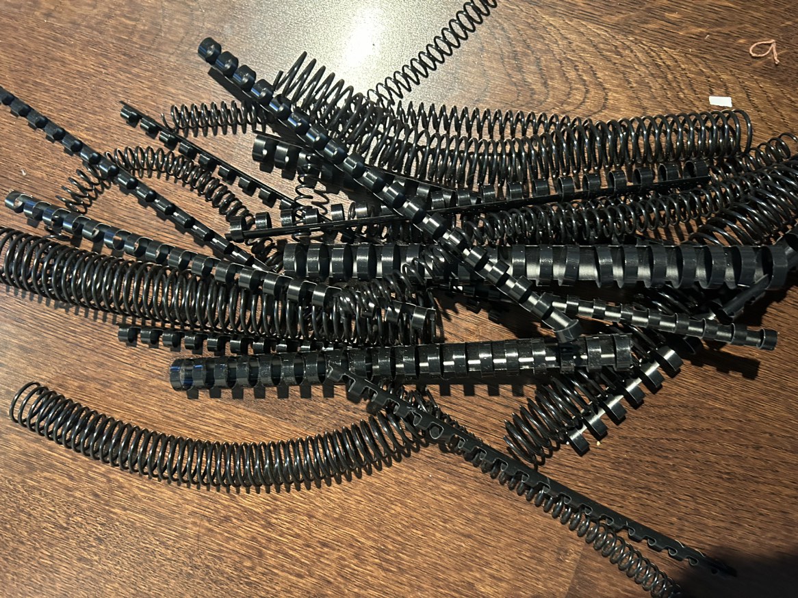Assorted Black Plastic Binding Combs thumbnail