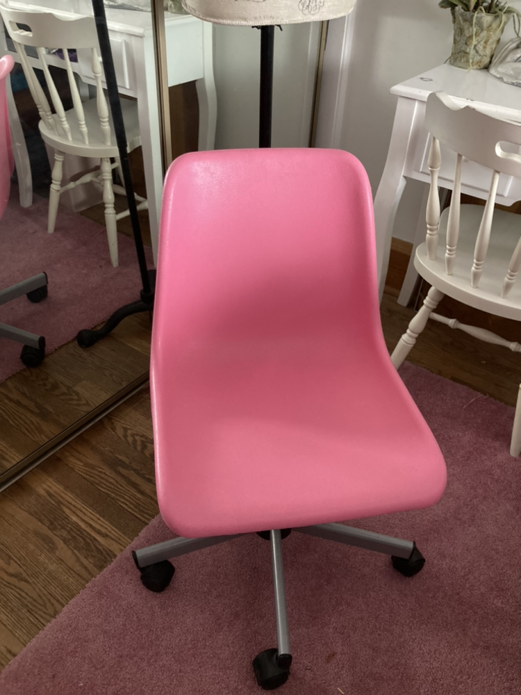 Pink plastic desk rolling chair thumbnail