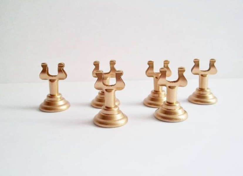Gold and silver table sign holder