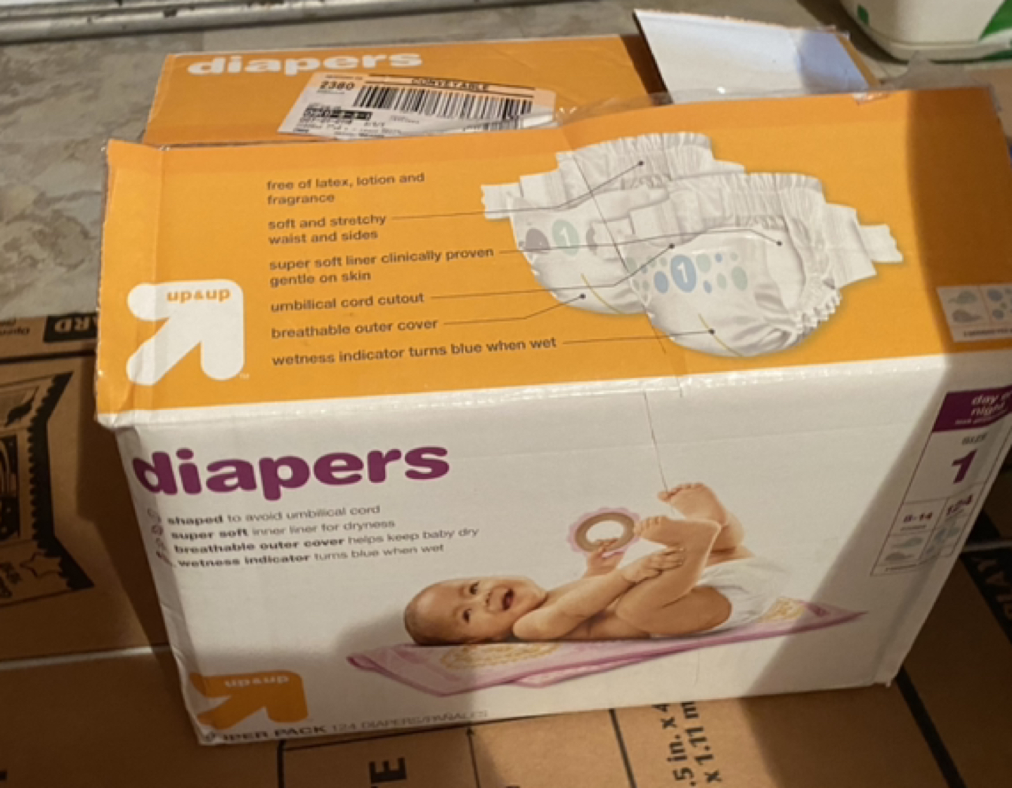 Opened diaper box size 1