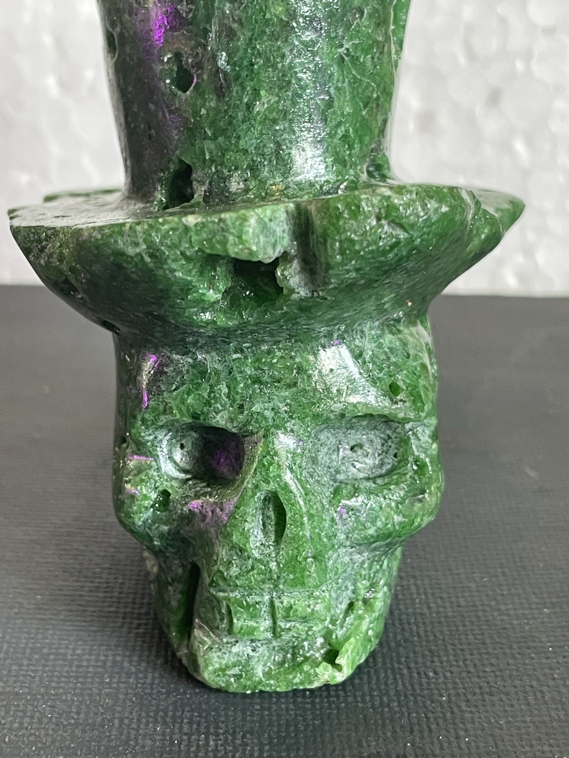 Carved skulls with tophats