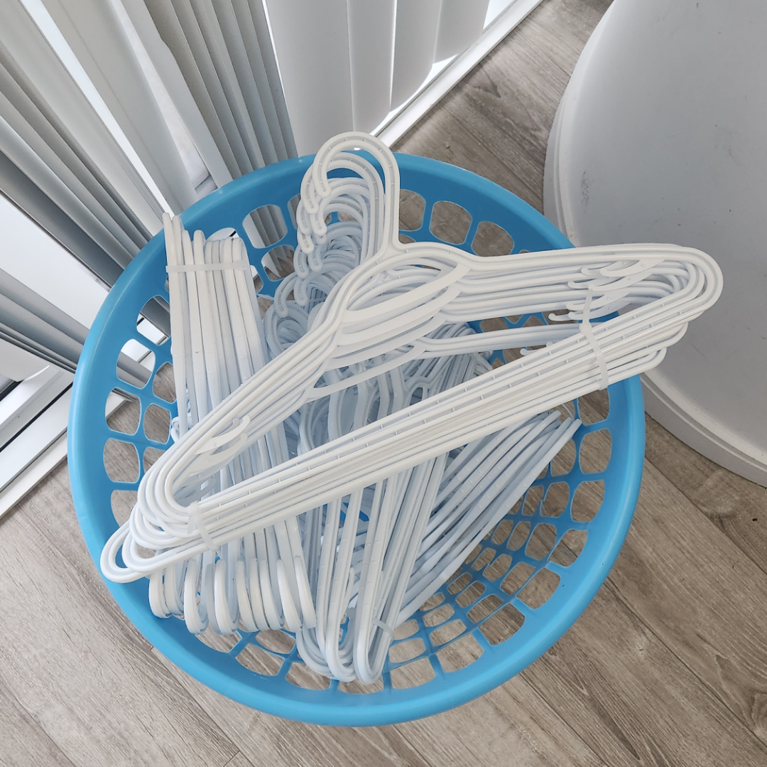 clothes hangers and hamper. - photo 2