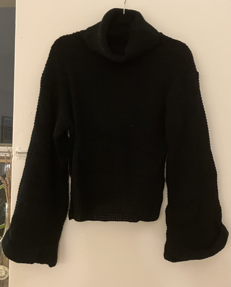 Black turtle neck sweater