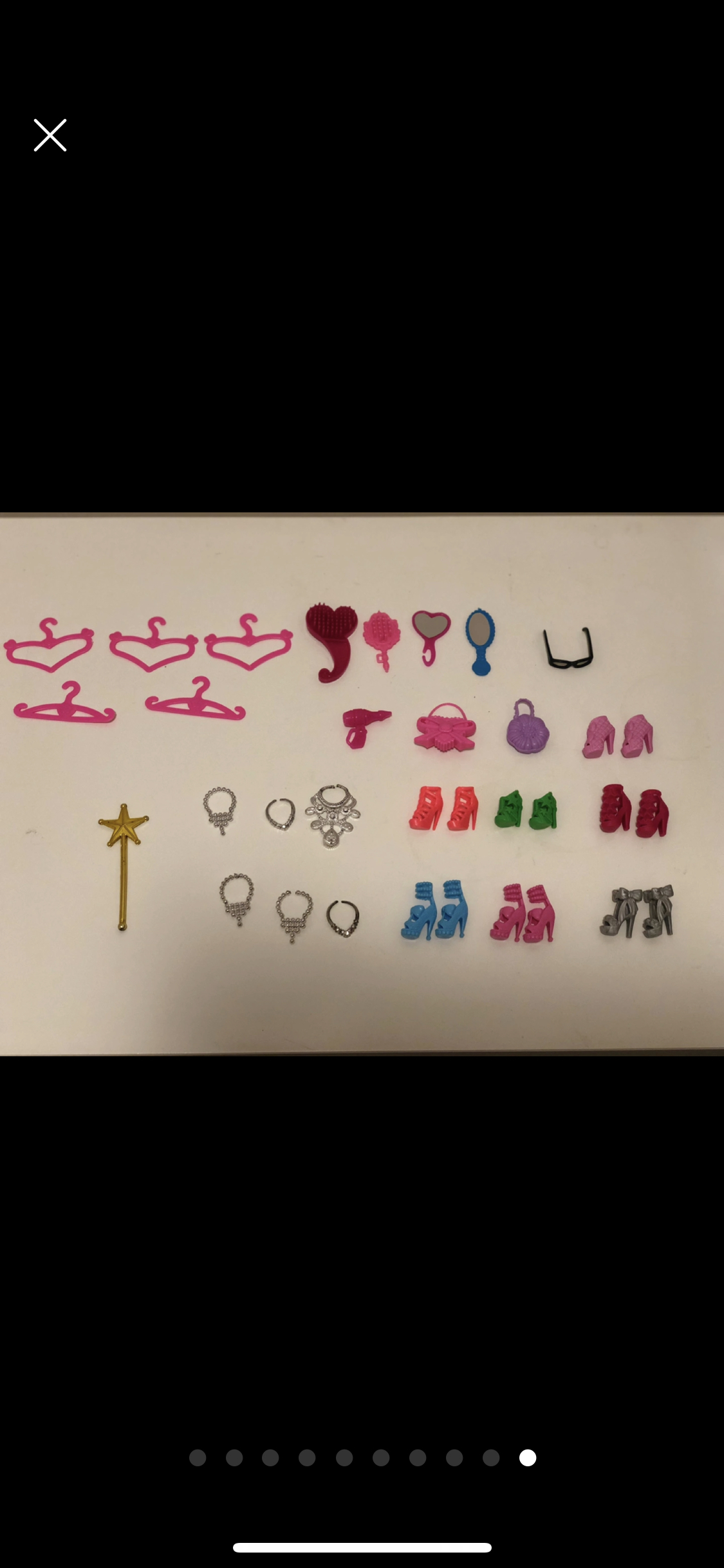 Barbie doll along with 9 exquisite Barbie dresses image indicator(10)