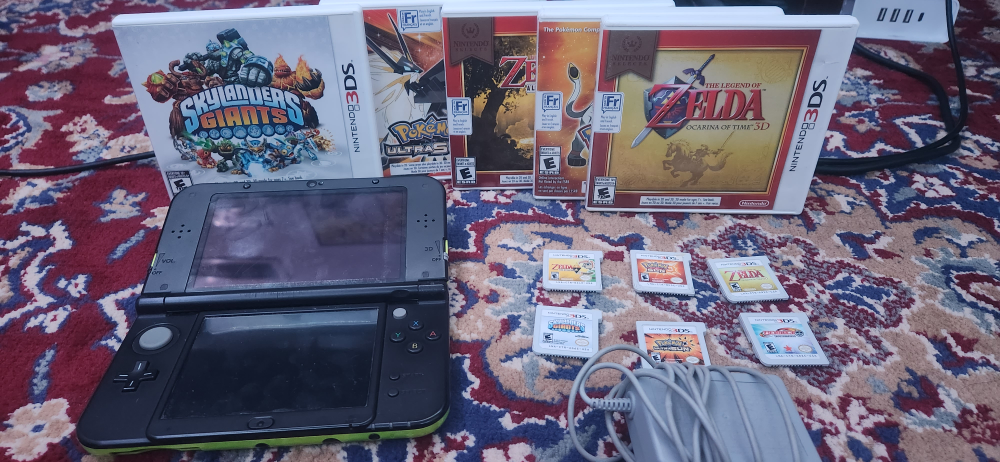 Selling New Nintendo 3ds XL lime green limited edition + games thumbnail