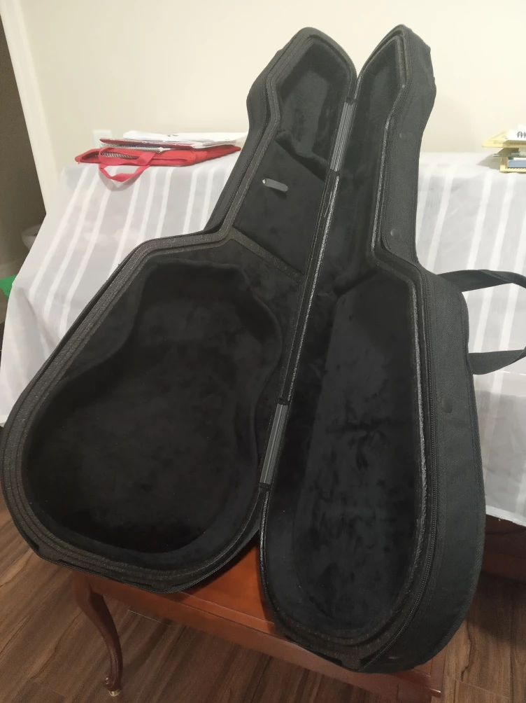 TRIC guitar case with Seagull logo