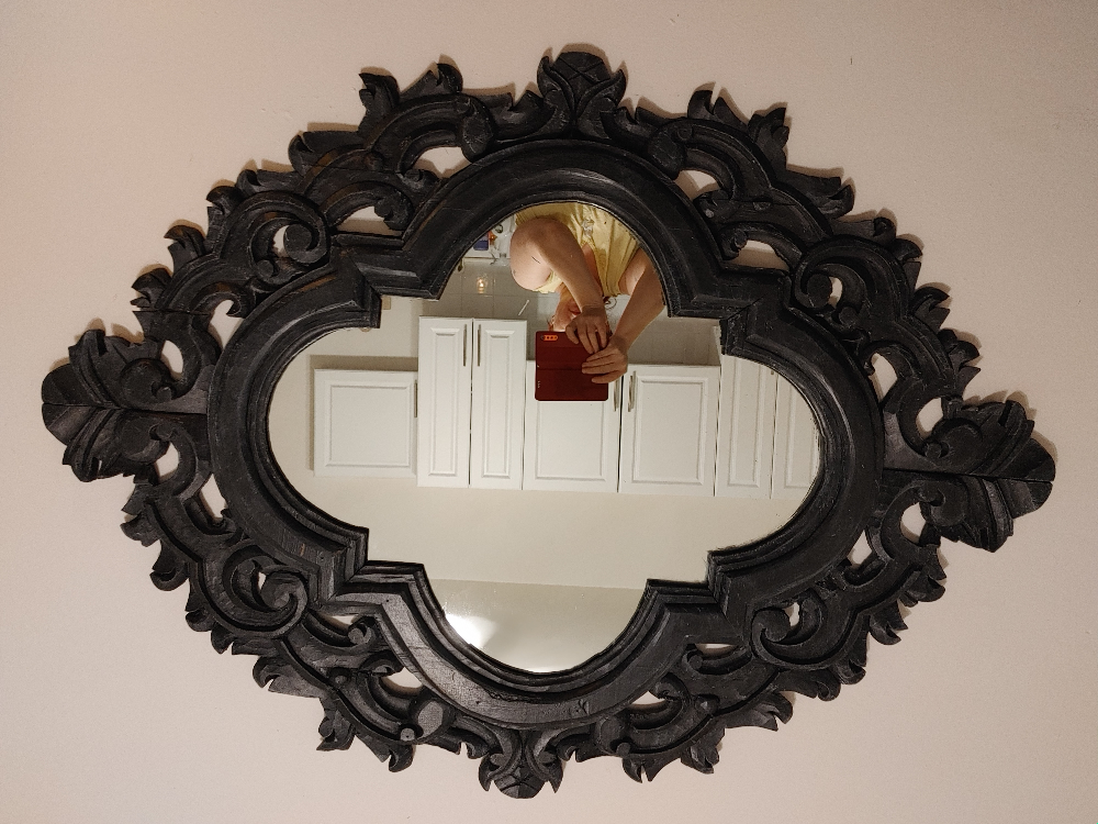 large heavy mirror