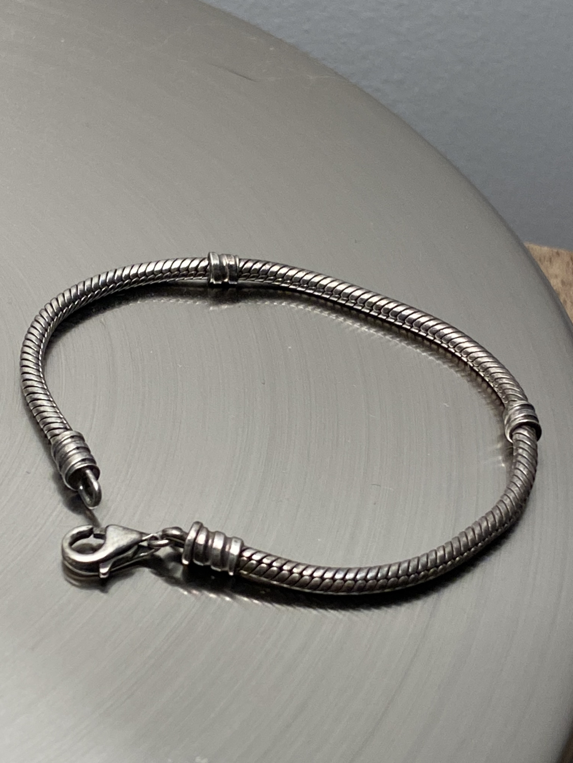Pandora bracelet with 4 charms image indicator(3)