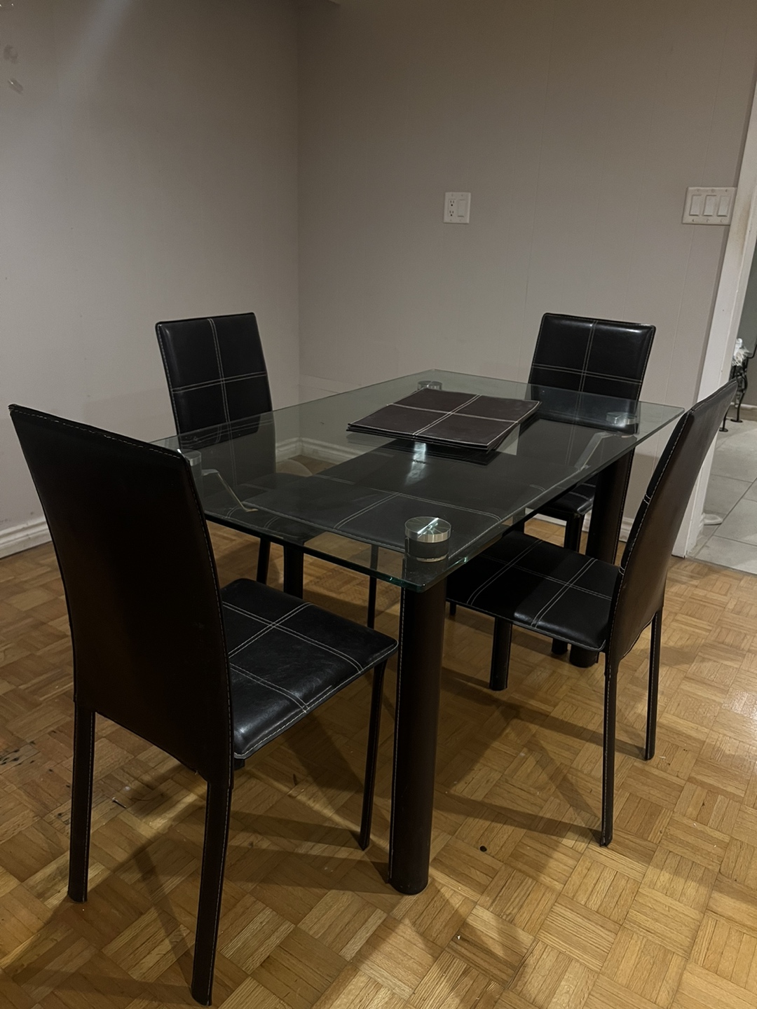 Glass Dining Table, 4 Chairs and 4 Table Mats