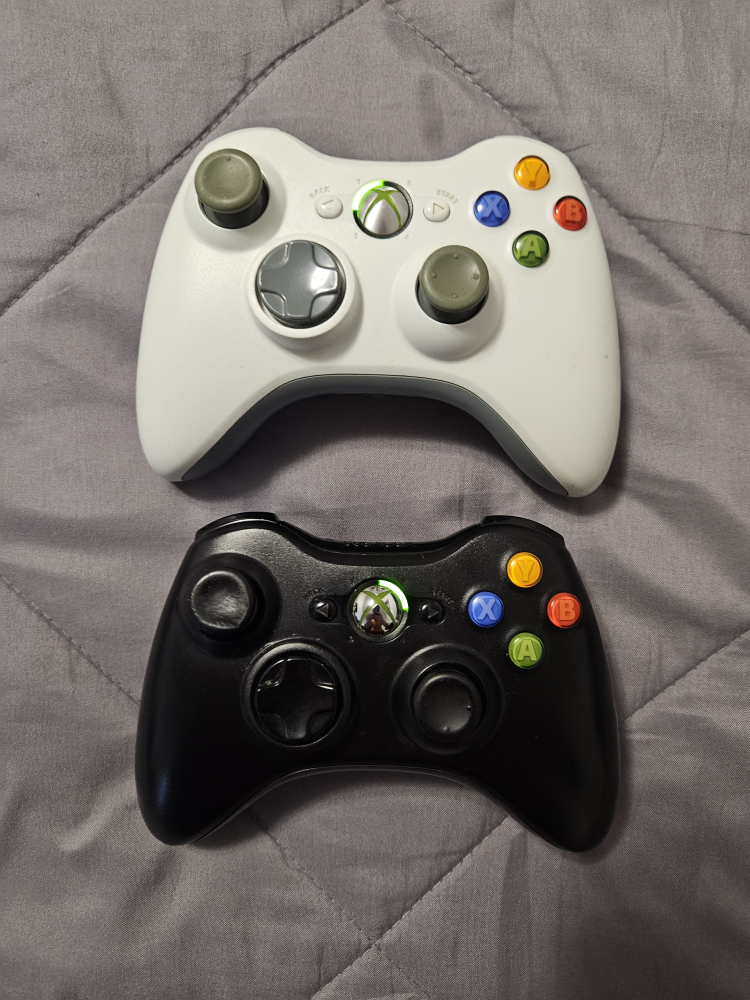 Two Xbox 360 Controllers thumbnail