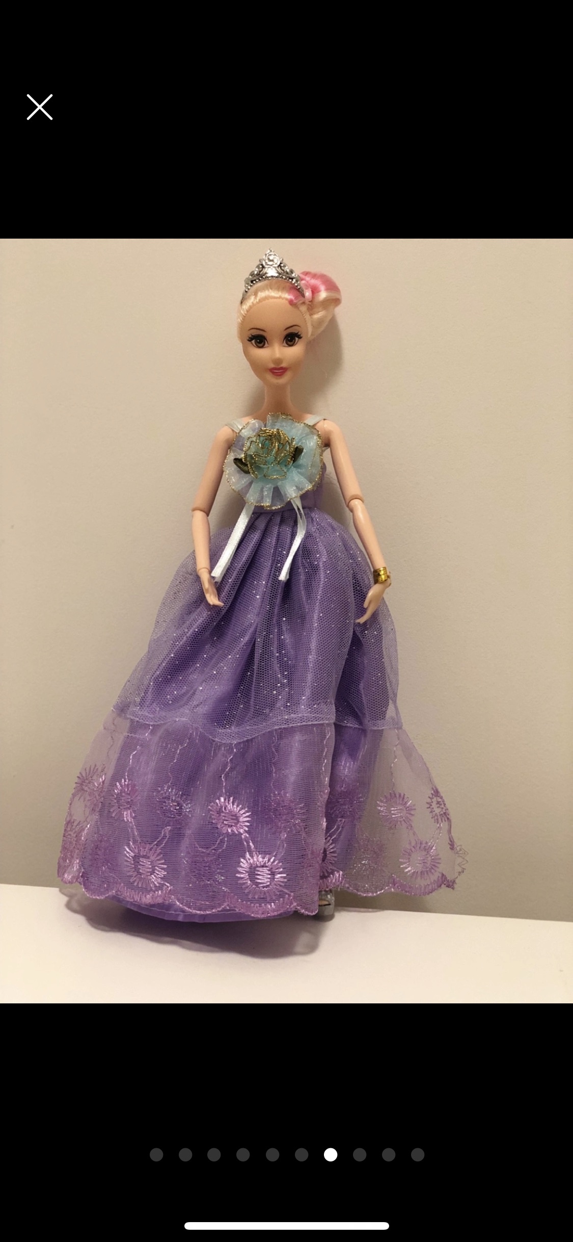 Barbie doll along with 9 exquisite Barbie dresses image indicator(7)