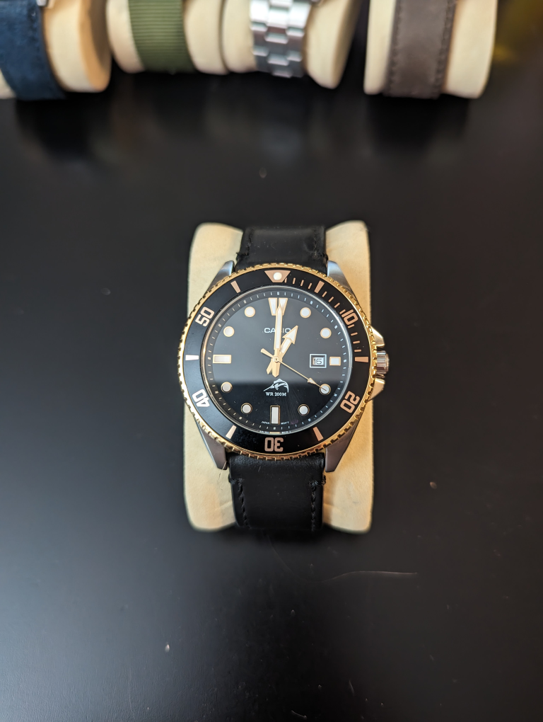 Casio MDV-106 Men's watch Black and gold Black leather strap