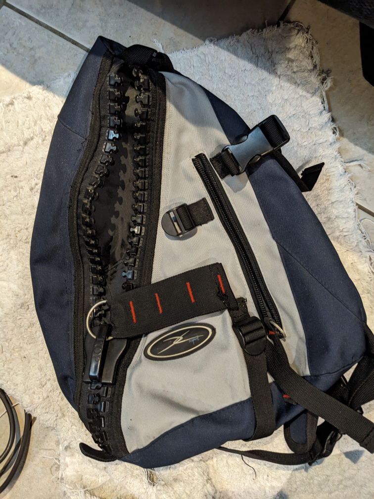 one strap small backpack with large zipper thumbnail