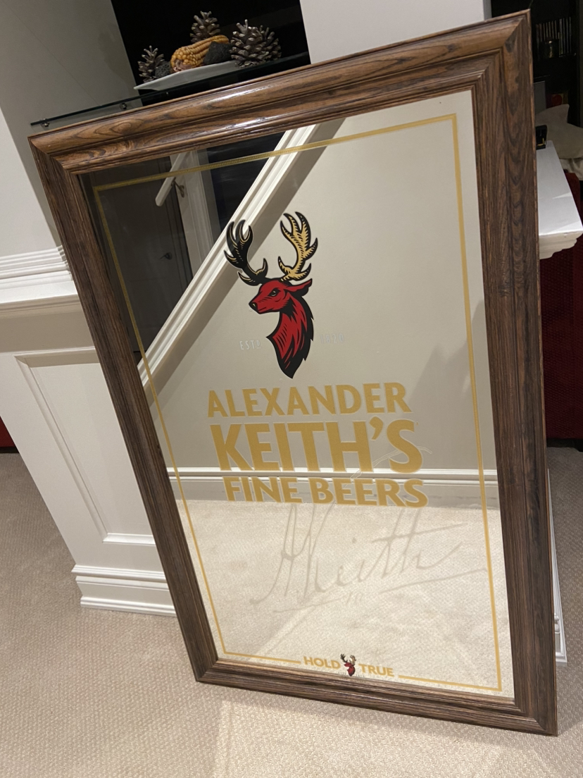 Alexander Keith bar/person cave mirror