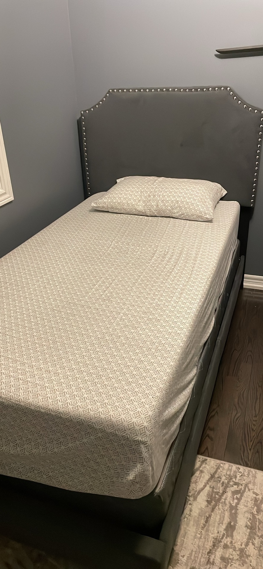 Twin size bed (includes mattress + box spring)