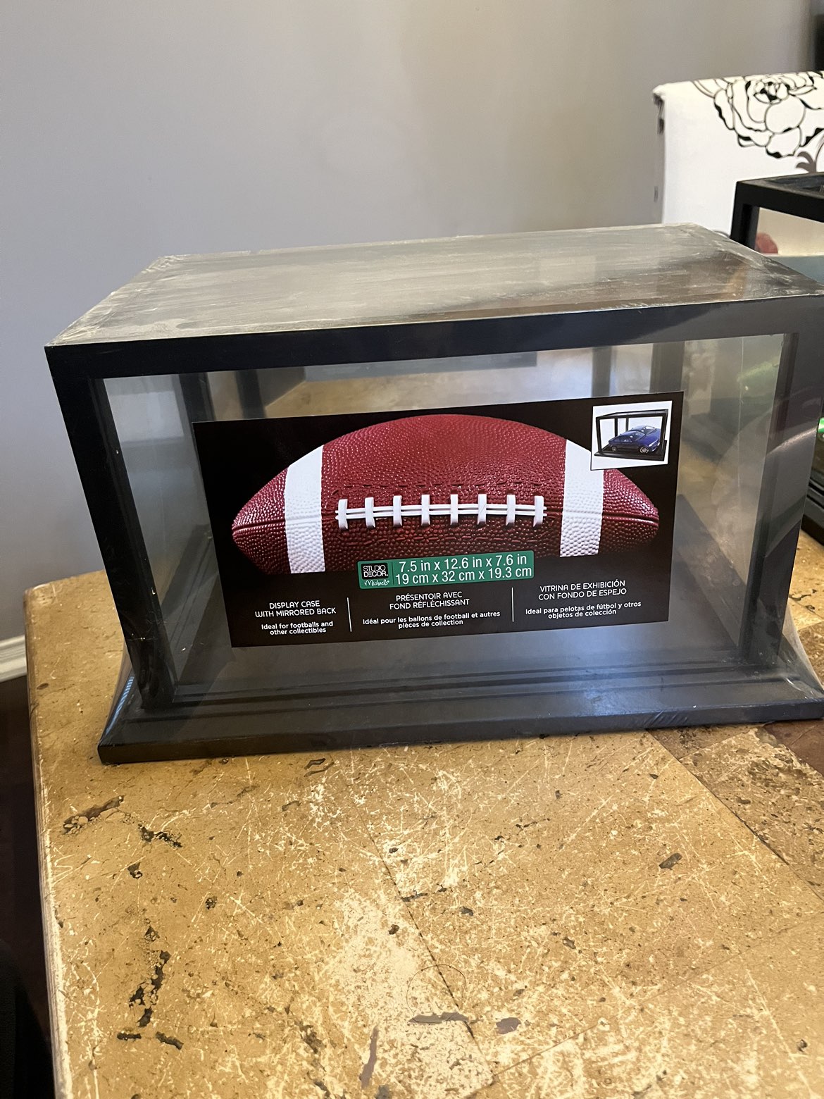 Display case mirrored back