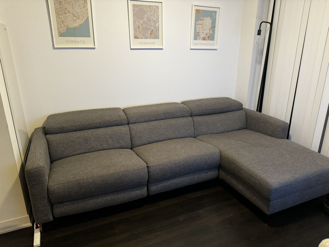 Sectional couch with recliner and adjustable headrests