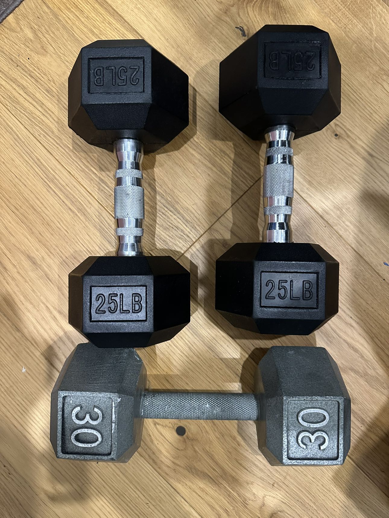 Dumbbells (2x 25 lb and 1x 30 lb)