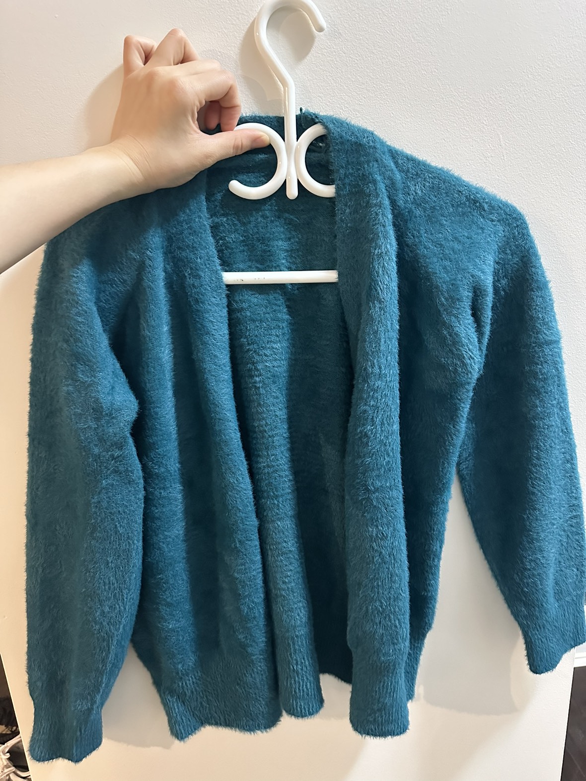 a woman's cardigan image indicator(2)