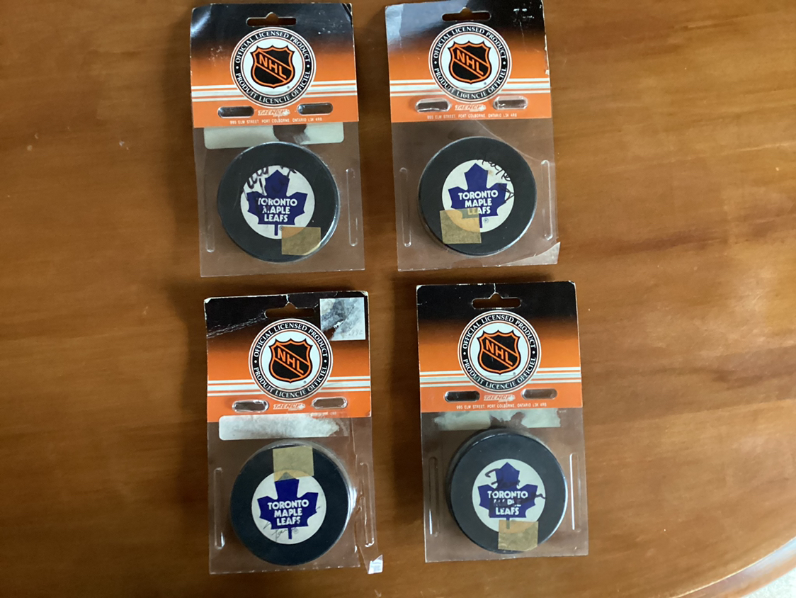 4. 1980’s Signed New Vintage TORONTO MAPLE LEAFS TRENCH PUCKS
