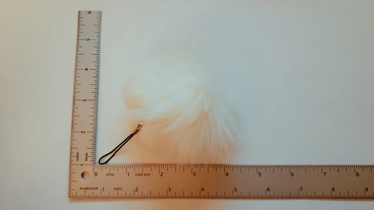 Faux fur pom pom phone strap thumbnail