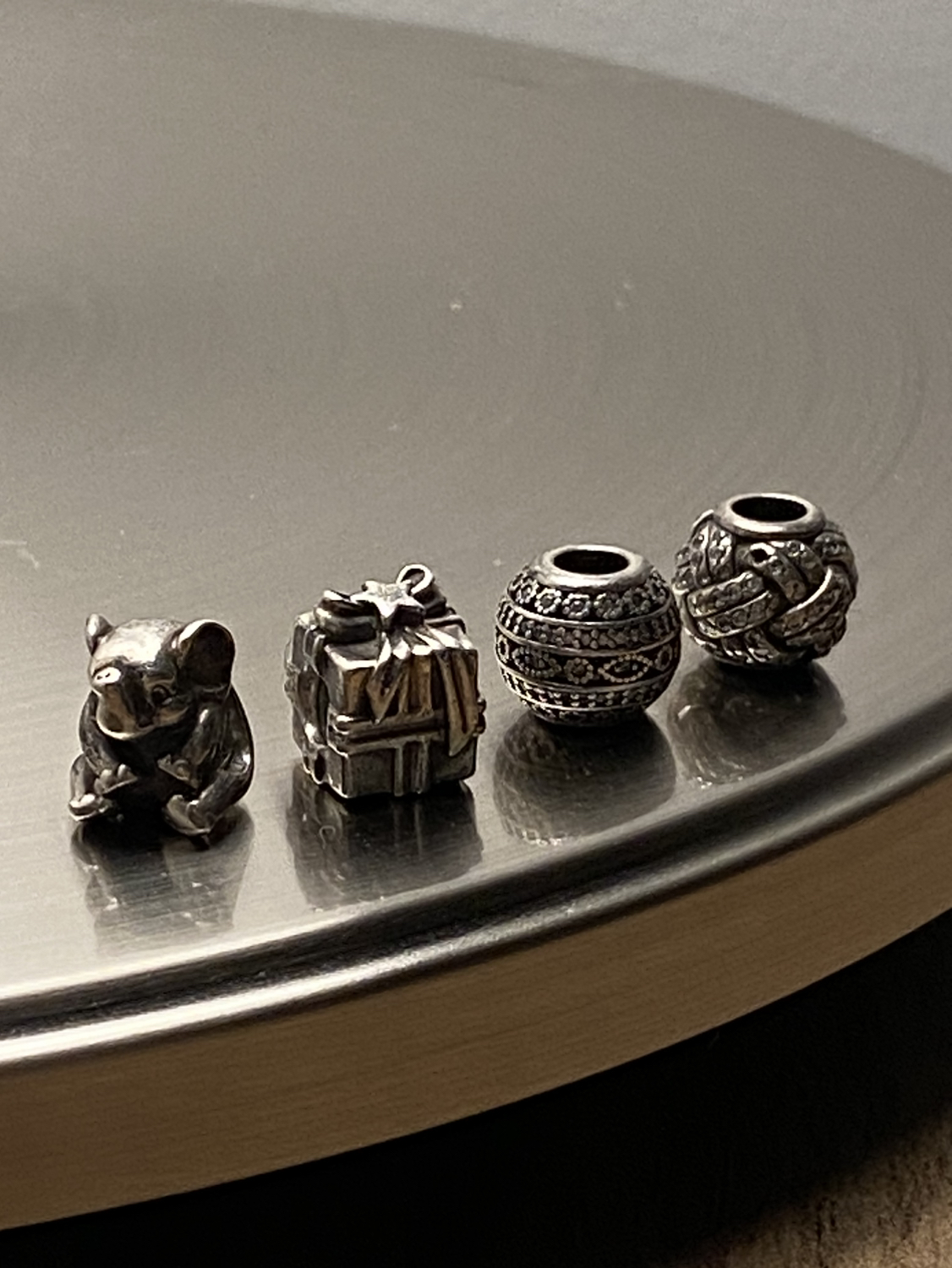 Pandora bracelet with 4 charms image indicator(2)