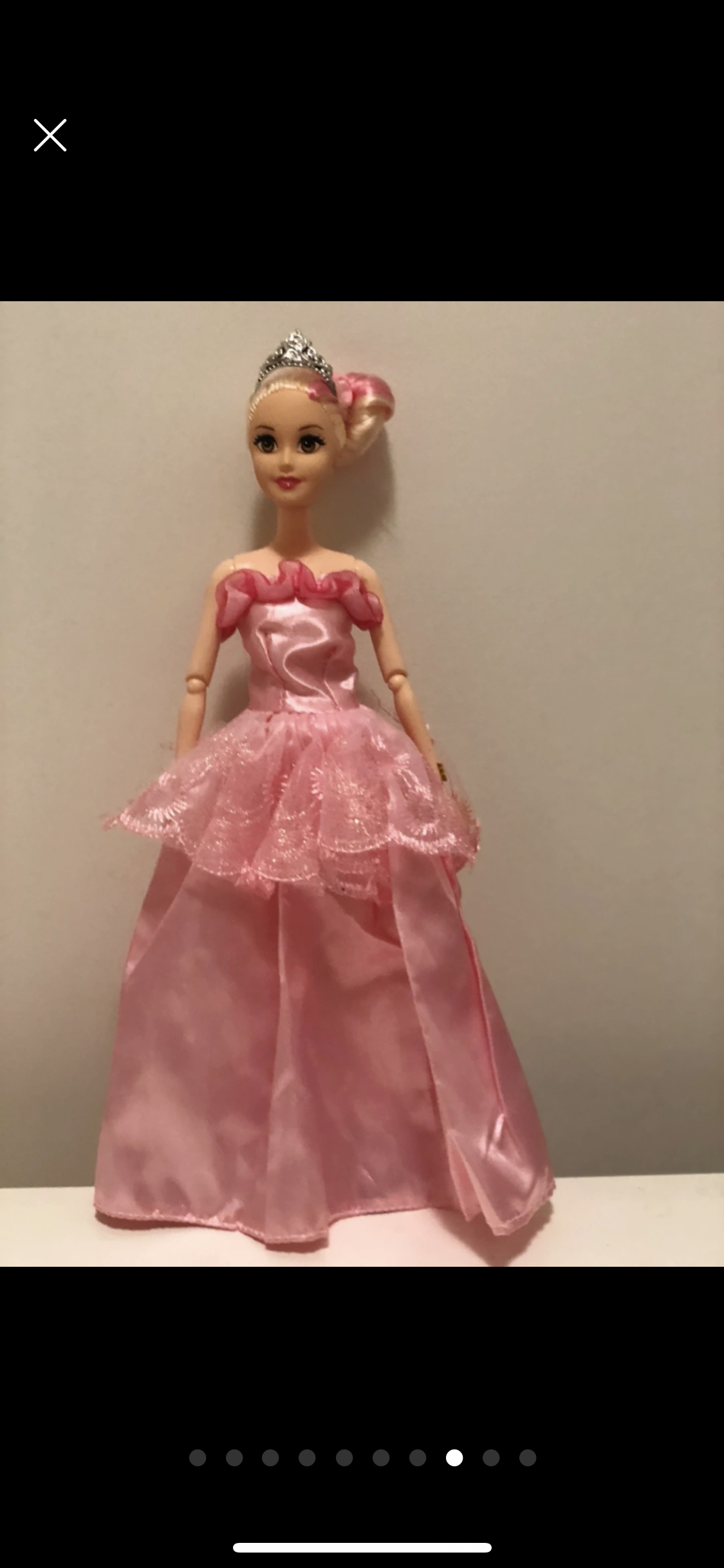 Barbie doll along with 9 exquisite Barbie dresses image indicator(8)