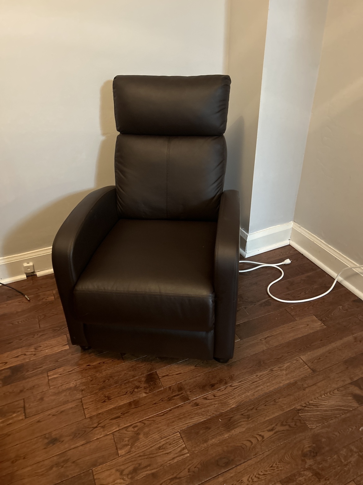 Brown recliner - faux leather.