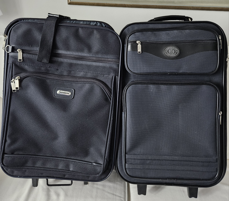 $25.00 for both Carry-on roller bags thumbnail