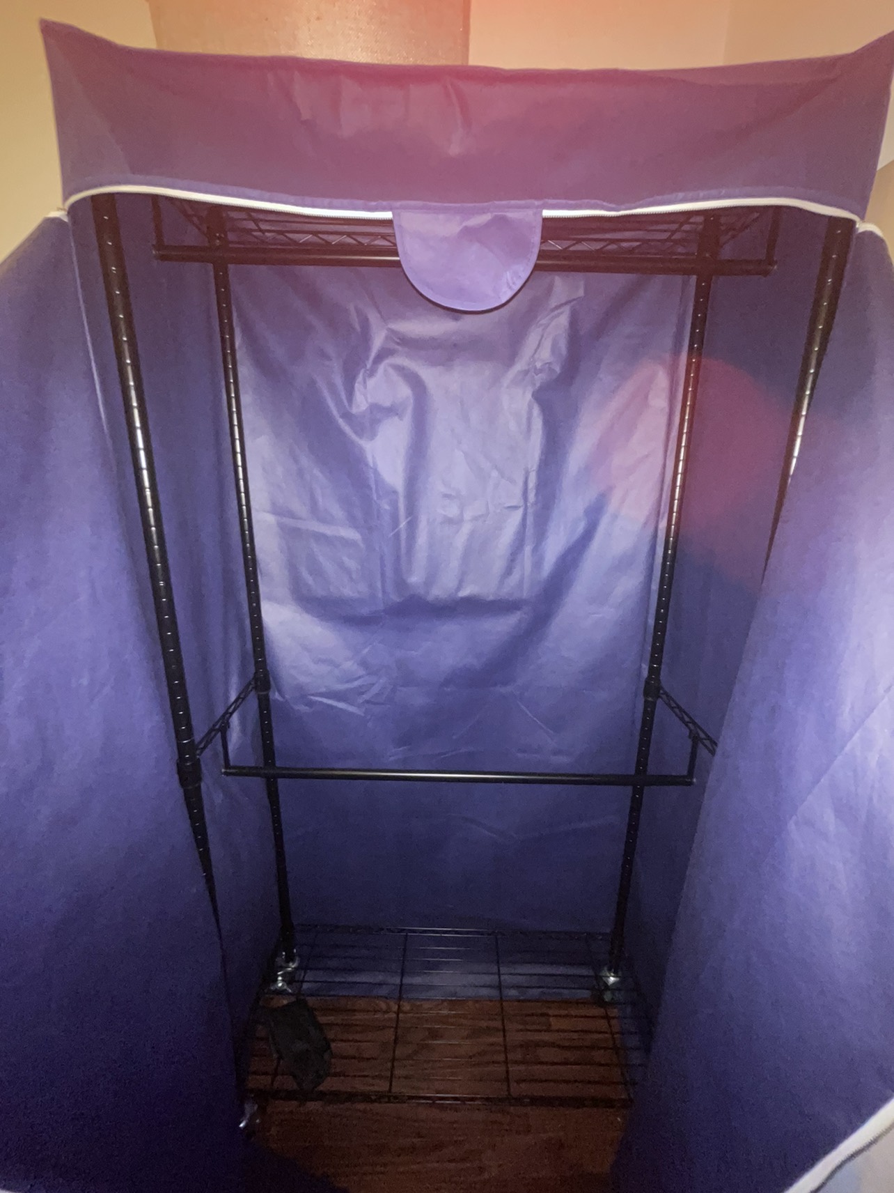 Portable wardrobe with cover