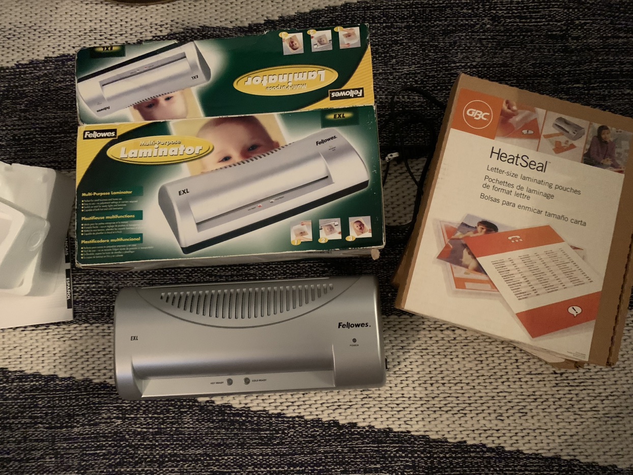 Laminator + Laminator Pouches Included
