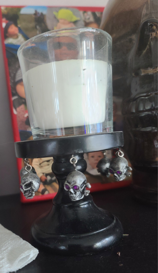 Skull candle holder with candle