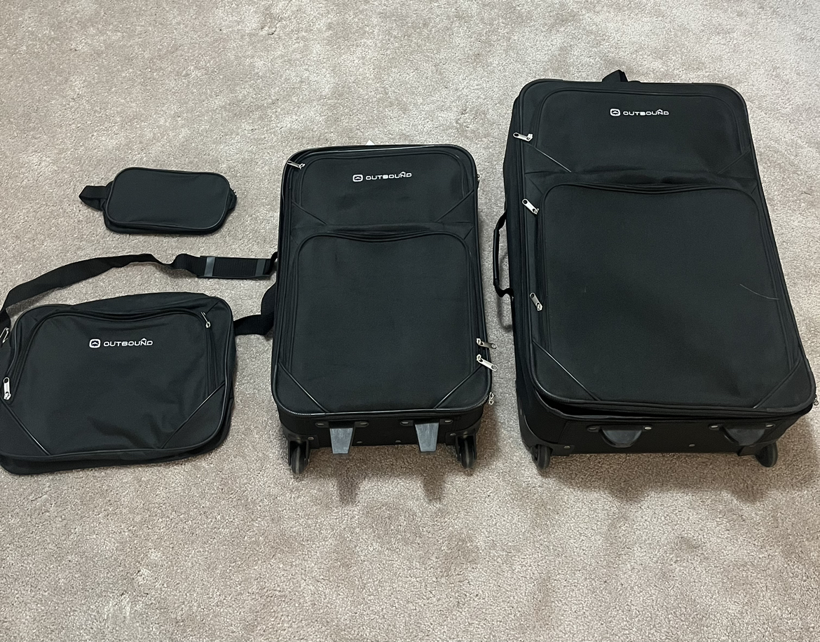 Outbound 4-Piece Softside Wheeled Travel Luggage Suitcase Set