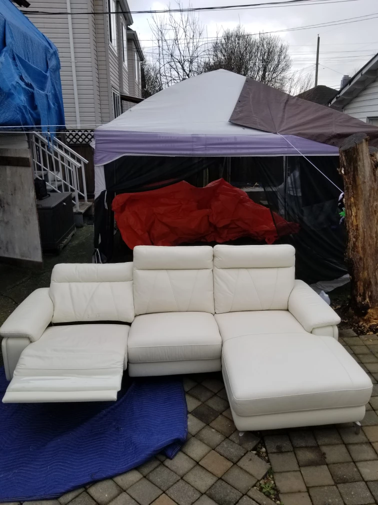 Leather Sectional Recliner Sofa.