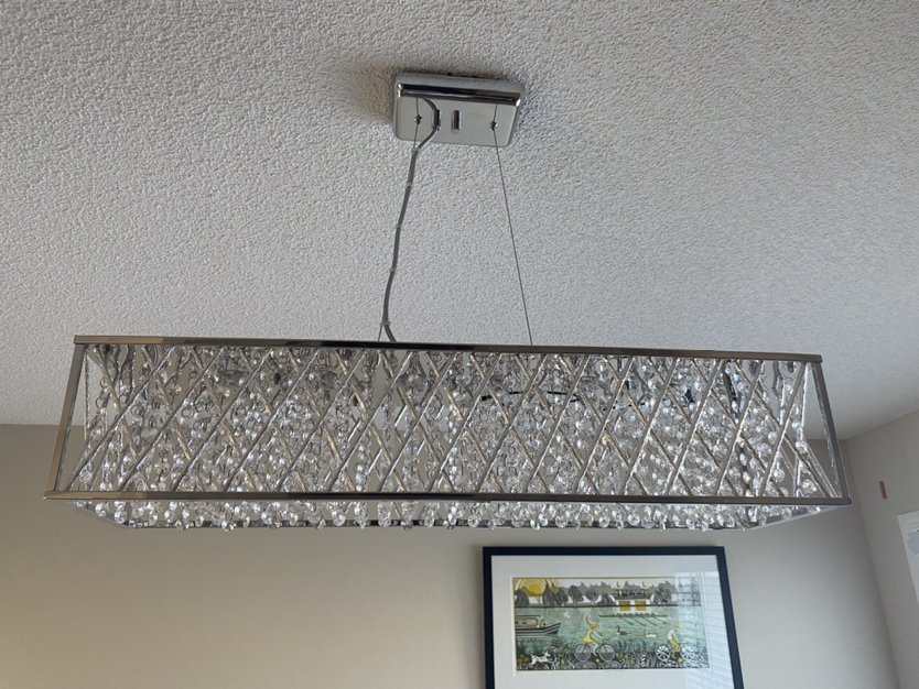 LED pendant with clear crystal strand shade