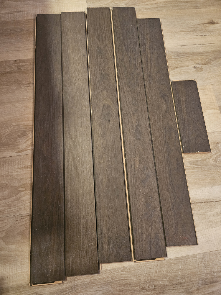 Old flooring, engineered hardwood (dark brown)