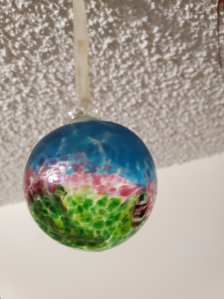 Blown glass ball. Hang in windows to catch the light thumbnail