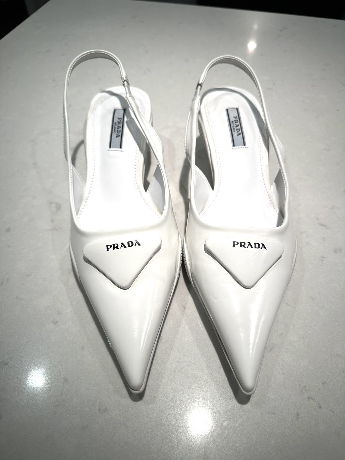 White Prada sling back kitten heels - photo 2