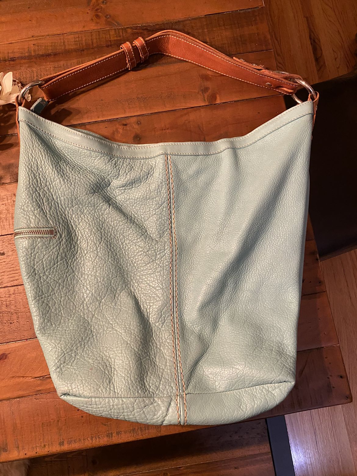 Roots leather bag