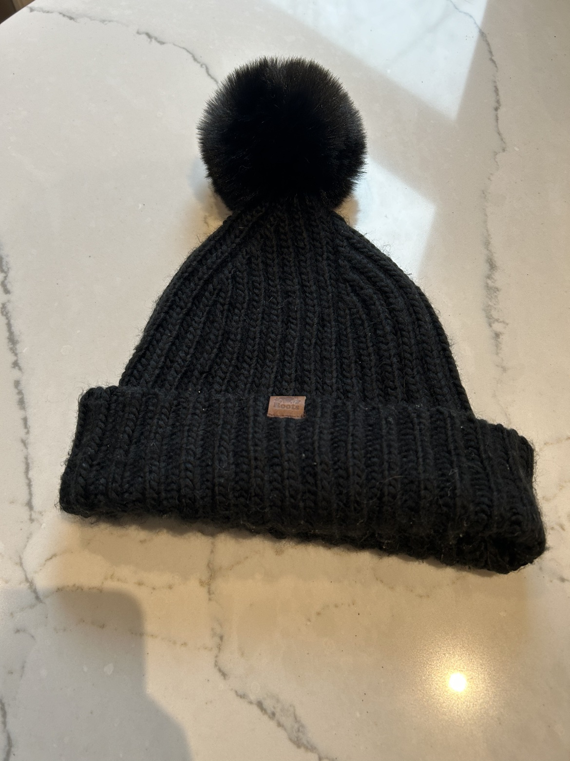 Roots black toque with Pom Pom
